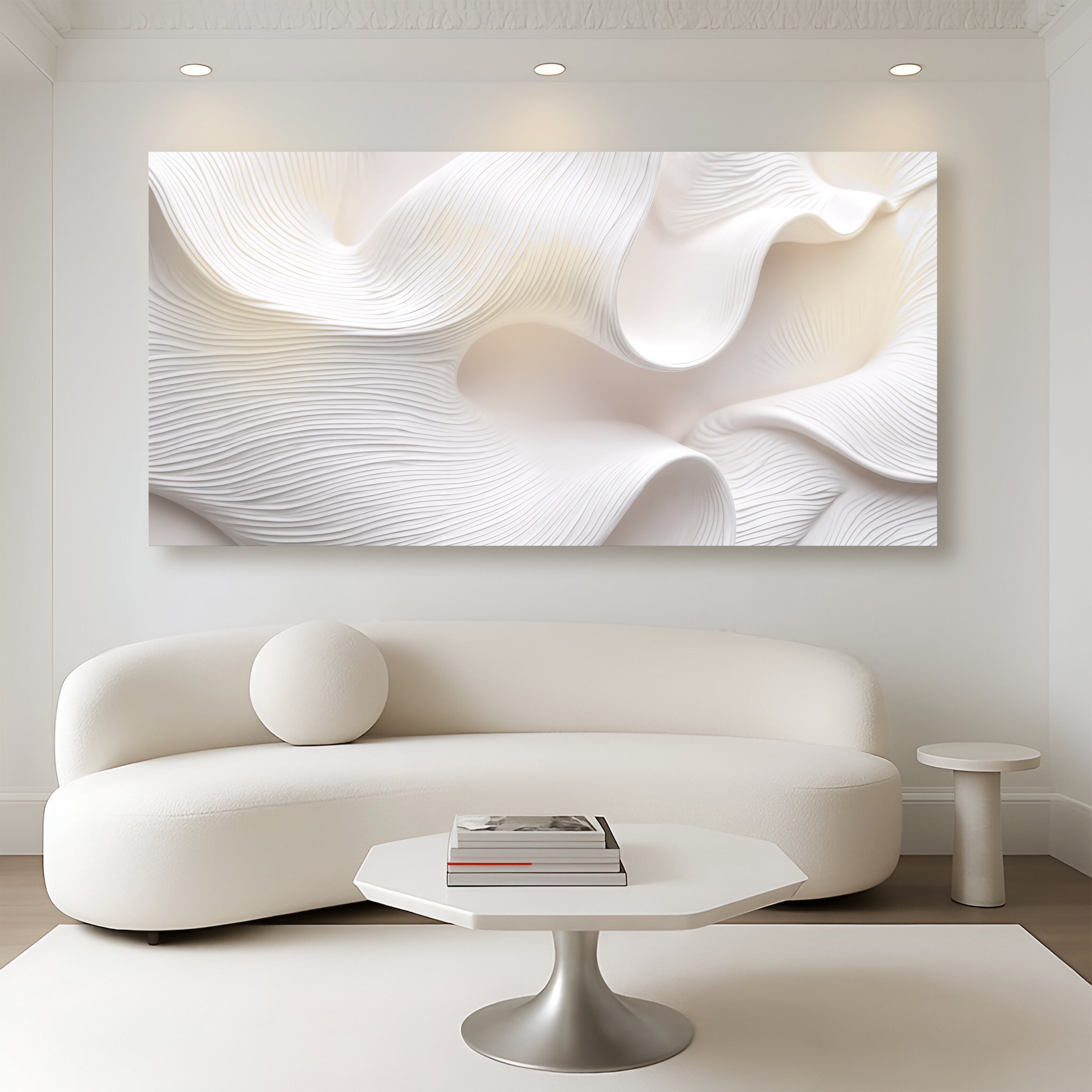 Modern living room with a white abstract painting on the wall, white sofa, and minimal decor.