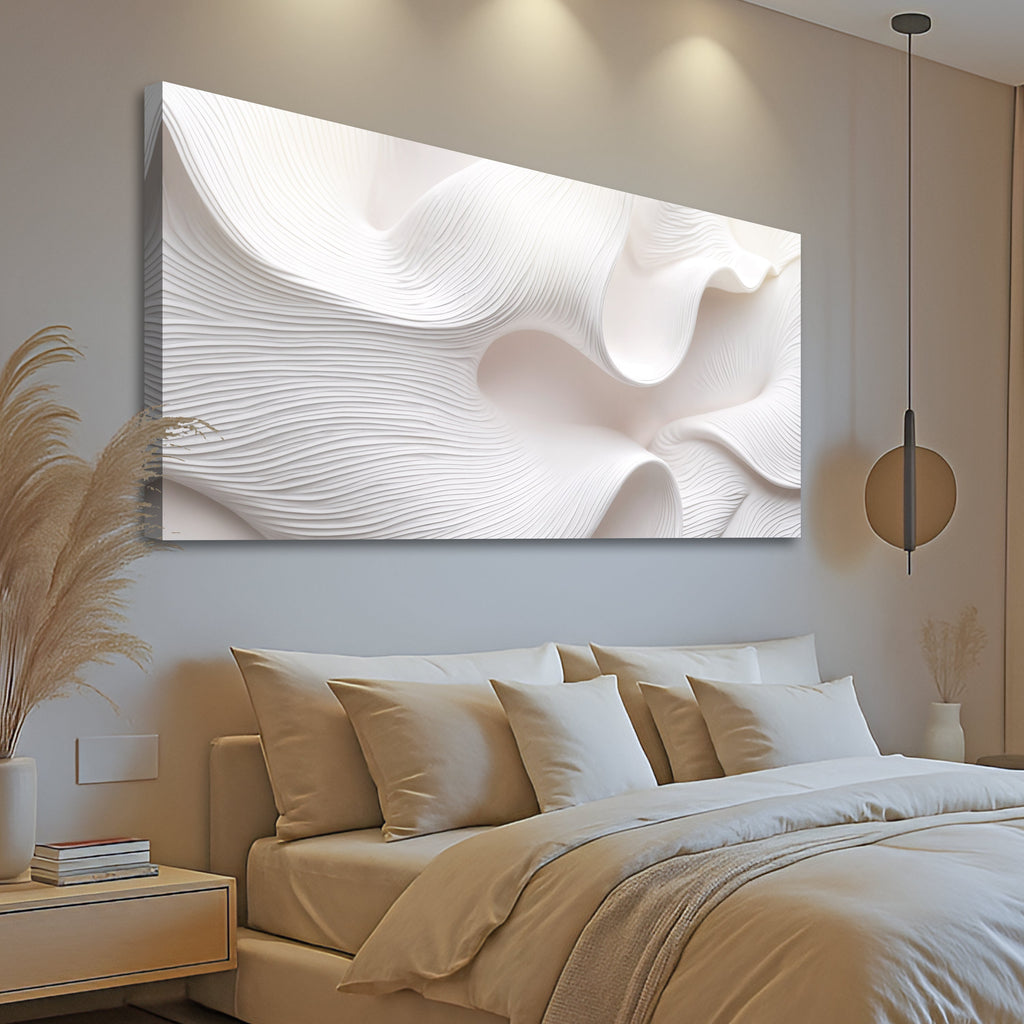 Modern bedroom with abstract wall art above a bed