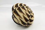 Woven basket with geometric pattern on a white background