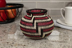 Woven basket with geometric pattern on a kitchen counter