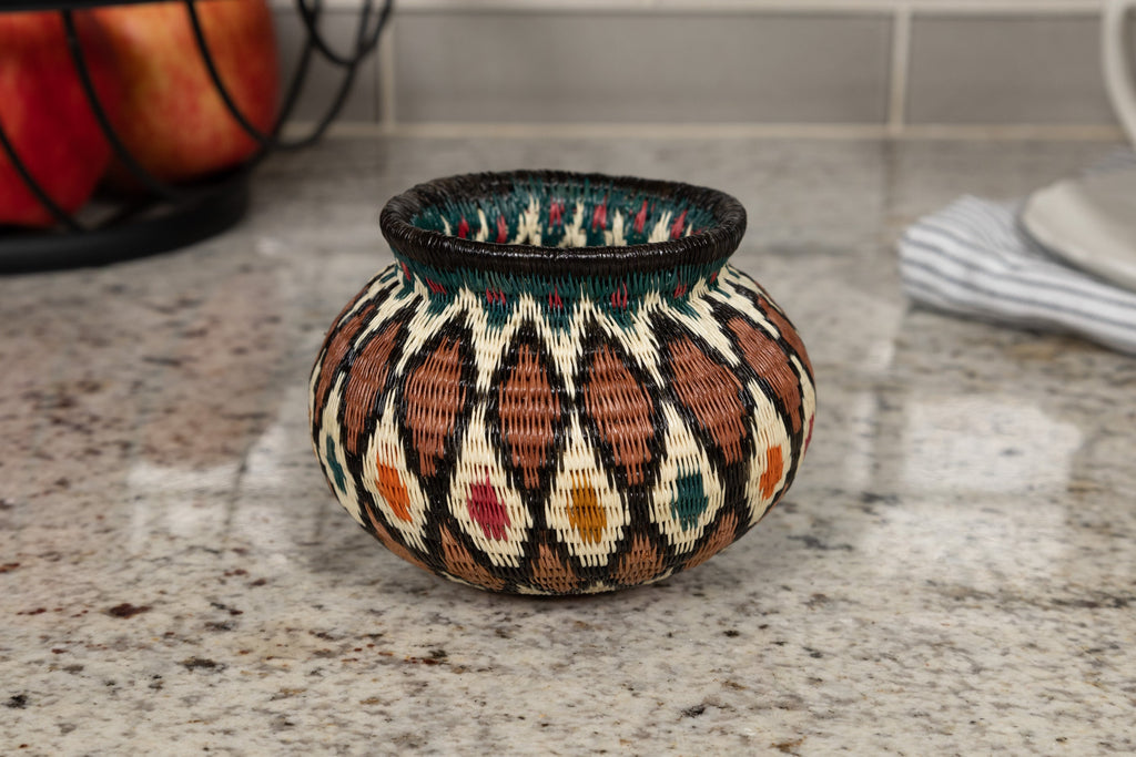 Decorative woven basket on a kitchen counter