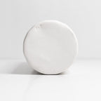 bottom of white oil dispenser bottle on white background