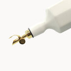 oil dispenser bottle with gold nozzle