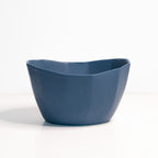 Blue ceramic bowl on a white background