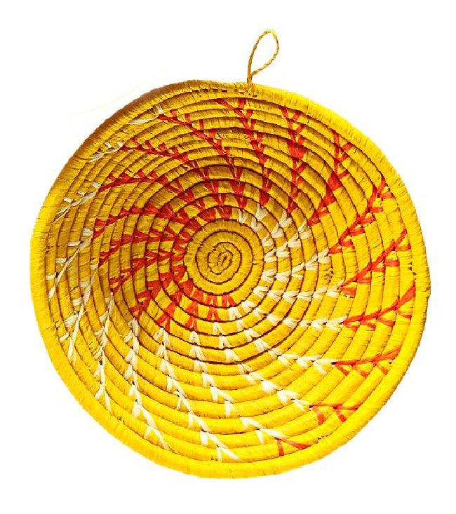 Yellow woven basket with red and white accents on a white background